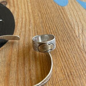 Indigenous Sterling Silver and 10k Yellow Gold Engraved Thunderbird Ring
